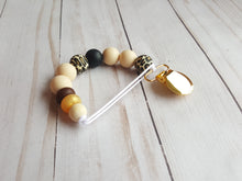 Load image into Gallery viewer, Exotic baby style binky holder with leopard beads and gold clip