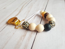 Load image into Gallery viewer, Exotic baby style binky holder with leopard beads and gold clip