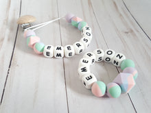 Load image into Gallery viewer, Tie-Dye personalized pacifier clip and teething loop matching set