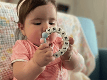Load image into Gallery viewer, Tie-Dye personalized pacifier clip and teething loop matching set
