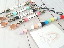 Load image into Gallery viewer, Leopard personalized pacifier clip with shiny rose gold clip. Exotic animal print baby style.
